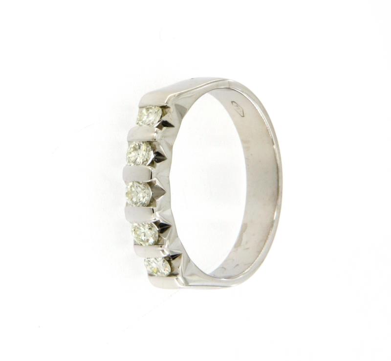Anello in oro bianco  750\1000 con 5 diamanti taglio brillante da 0.10 ct cadauno colore h,purezza vs mis.16
