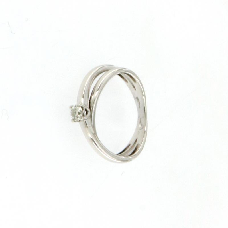 Anello in oro bianco 750\1000 solitario ,diamante taglio brillante da 0.10 ct colore h,purezza vs mis 12