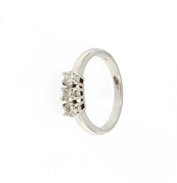 Anello in oro bianco 750\1000 trilogy con 3 diamanti taglio brillante da 0.17 ct cadauno colore j purezza si3 mis16