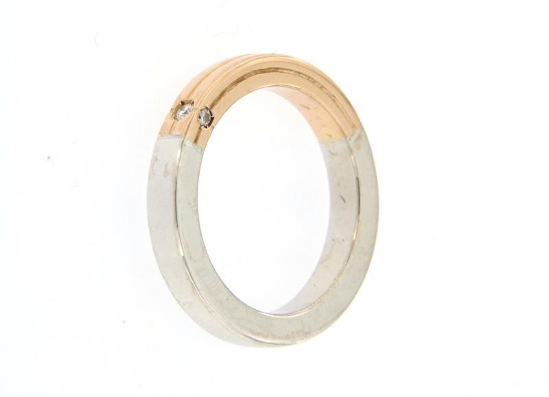 Polello anello due ori 750\1000 mis. 9 con diamantino centrale