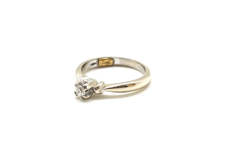 Recarlo - solitario oro bianco 750/1000 con diamante da ct 0.12  g color   mis. 11