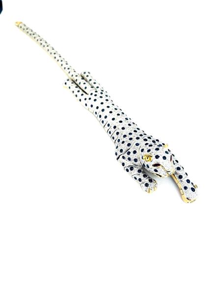 Bracciale in oro bianco750/1000 pantera semirigida  con zaffiri cabochon e diamanti ct 1.45 color h si3