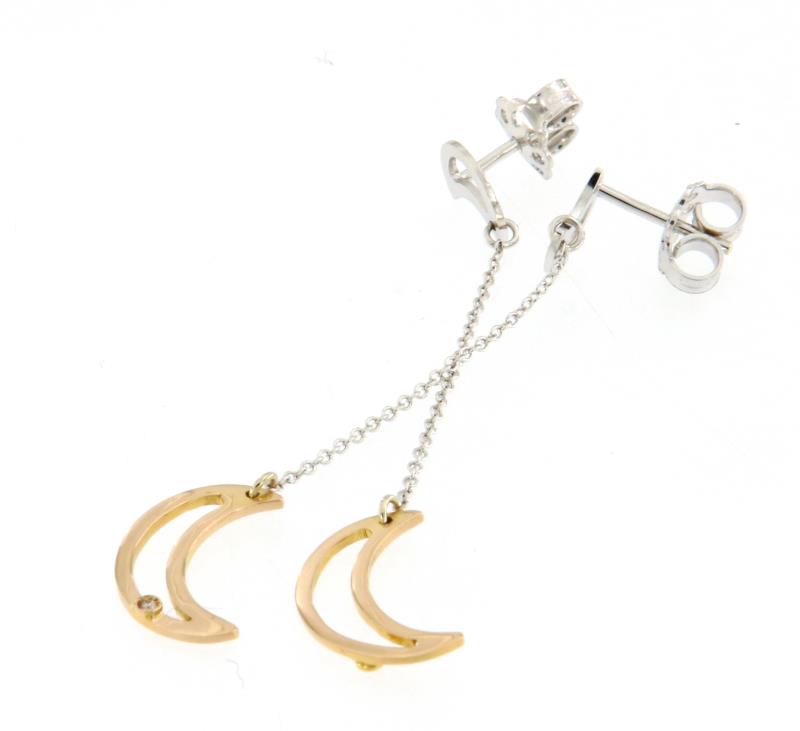 Coppia di orecchini due ori 750\1000 con mezzelune